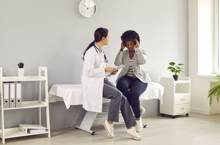 Headaches and Brain Tumors Physician evaluating a patient with persistent headaches and discussing Brain MRI at 14 Street Medical Arts