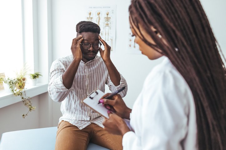 Headache & Migraine Specialist NYC Board-certified neurologist evaluating a patient with chronic headaches and migraines at 14 Street Medical Arts
