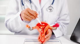 Dr. Karl Zhang discussing uterine fibroid treatment options with a patient at 14 Street Medical Arts in New York City