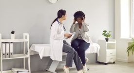 Headaches and Brain Tumors Physician evaluating a patient with persistent headaches and discussing Brain MRI at 14 Street Medical Arts