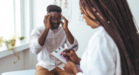 Headache & Migraine Specialist NYC Board-certified neurologist evaluating a patient with chronic headaches and migraines at 14 Street Medical Arts